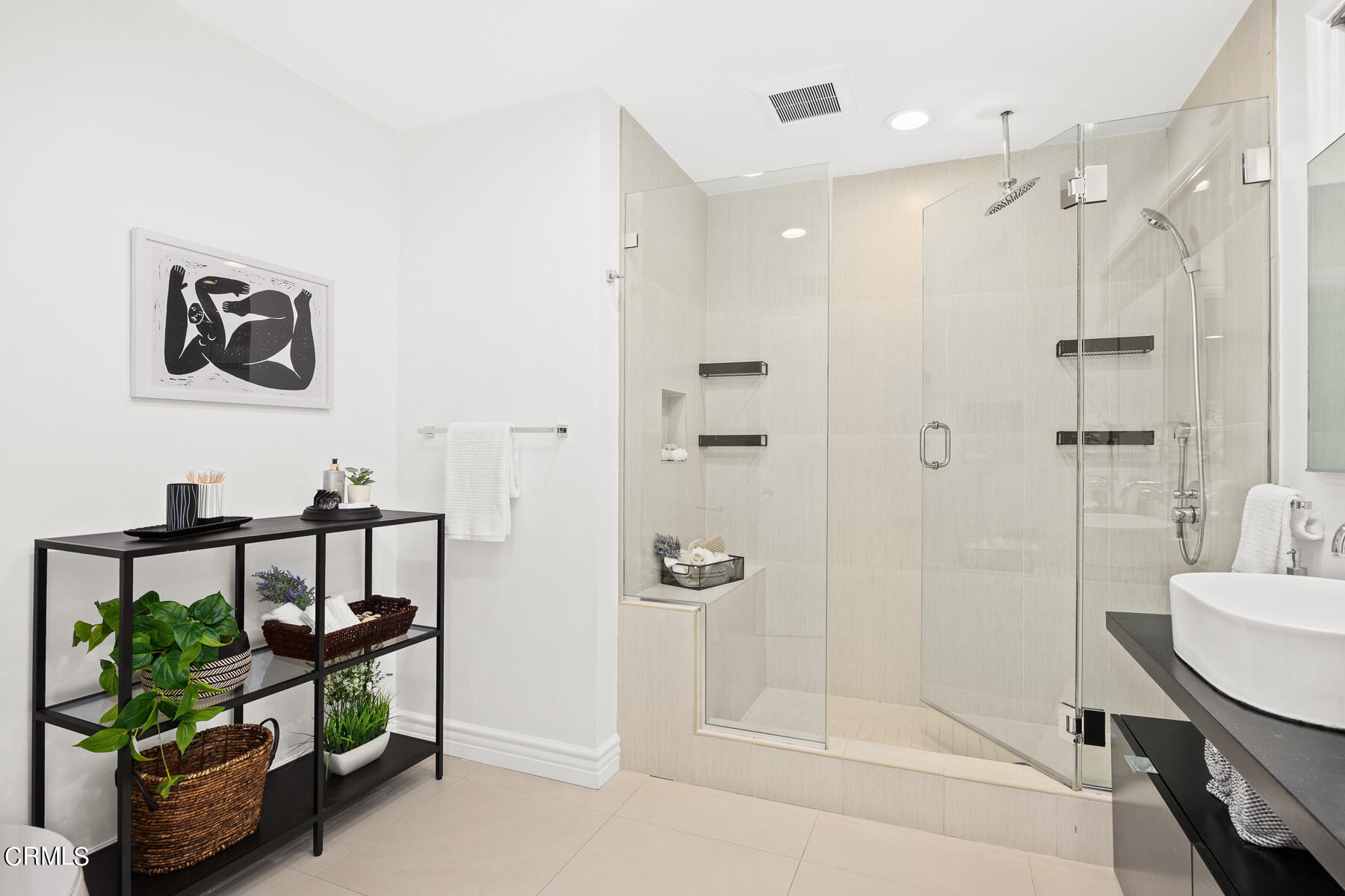 1770 Kaweah Drive Pasadena, CA 91105 - Photo 25 of 42 a bathroom with a sink a mirror and a shower