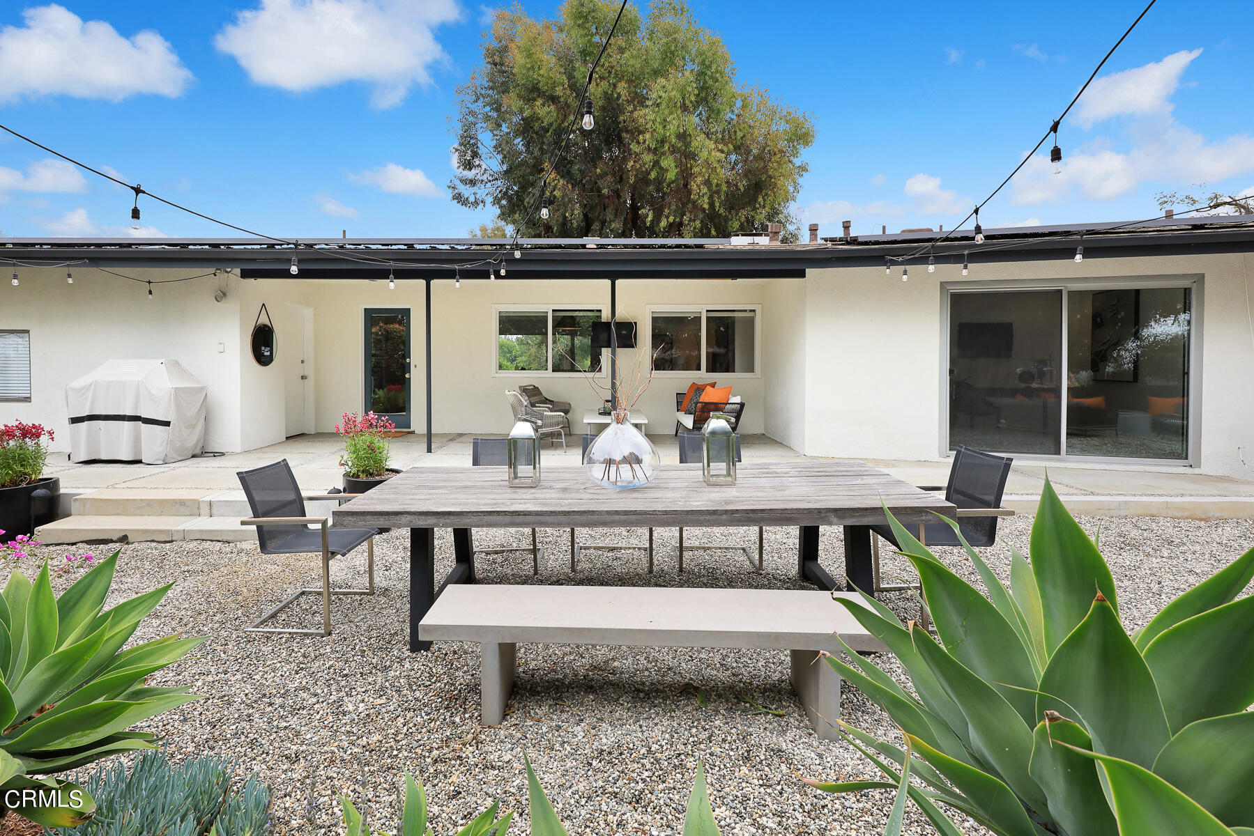 1770 Kaweah Drive Pasadena, CA 91105 - Photo 30 of 42 a view of a patio with table and chairs with wooden floor and fence