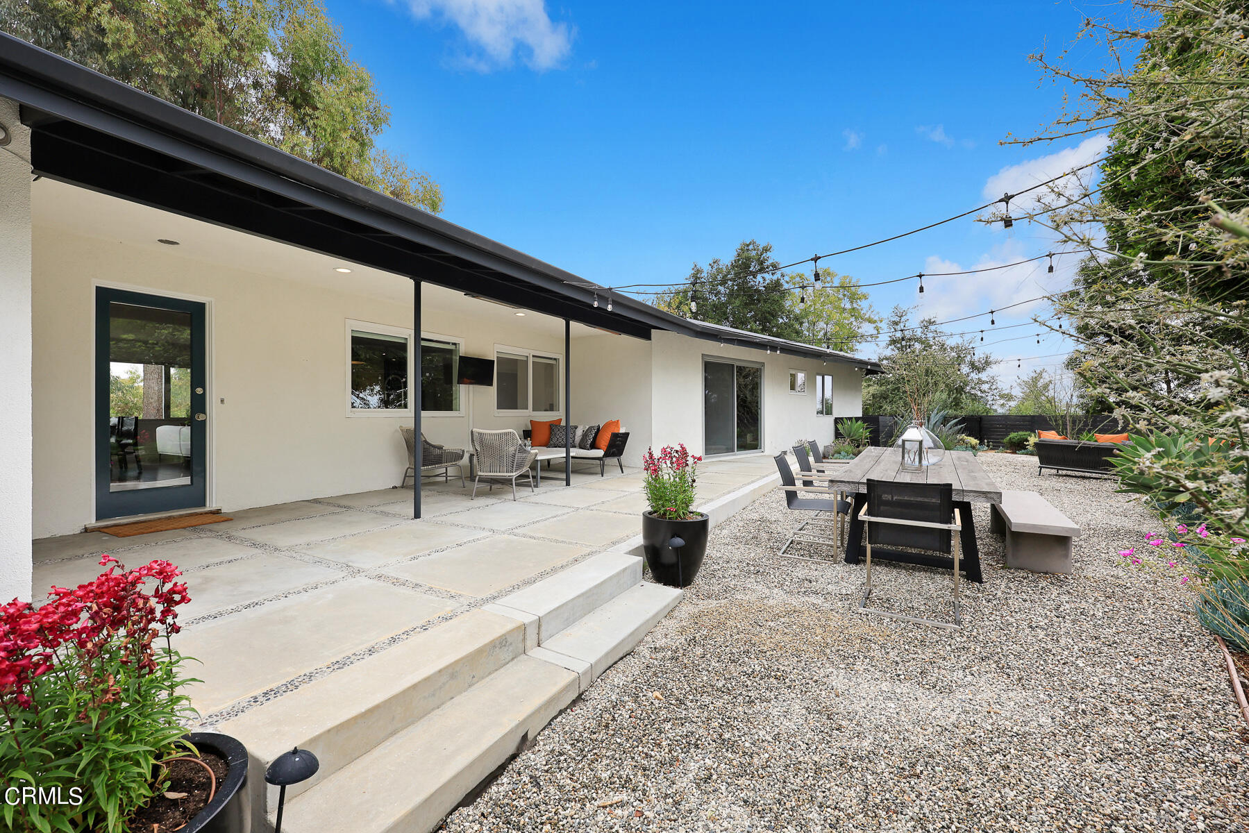 1770 Kaweah Drive Pasadena, CA 91105 - Photo 32 of 42 a view of a patio with table and chairs and potted plants