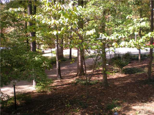 3417 Hackney Court Raleigh, NC 27613 - Photo 23 of 23 View of yard from front porch. Even the front yard offers privacy and a beautiful natural setting. Welcome home! Yard