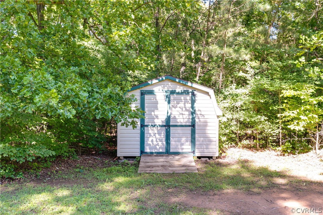 4601 Powhatan Lakes Road Powhatan, VA 23139 - Photo 13 of 15 In the side yard you will find a detached shed for