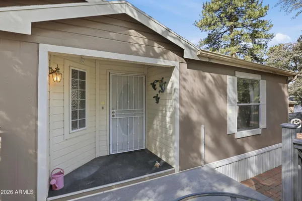 a view of a house with a glass door