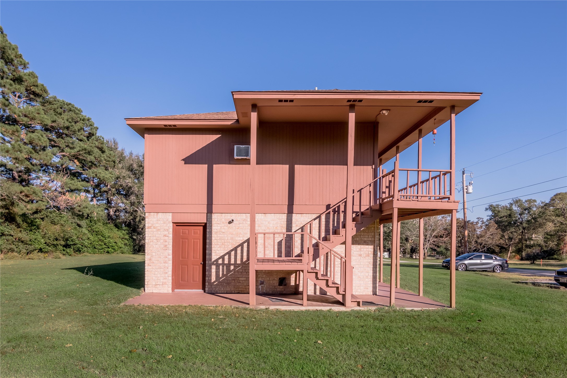 120 McAdams Lane, Unit F Huntsville, TX 77320 - Photo 20 of 21 front view of house with a yard