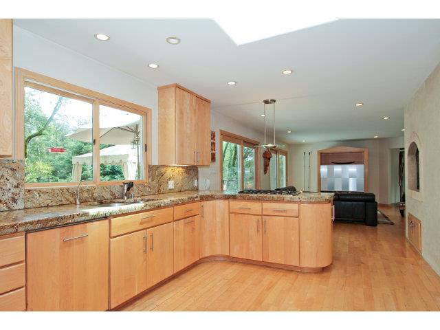 450 Summit Spring Road Woodside, CA 94062 - Photo 4 of 19 a kitchen with stainless steel appliances granite countertop a sink and cabinets