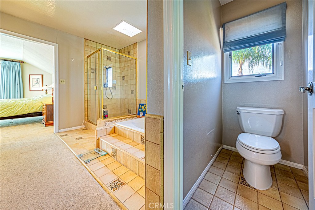 22138 Rim Fire Lane Diamond Bar, CA 91765 - Photo 29 of 61 a bathroom with a sink toilet and shower