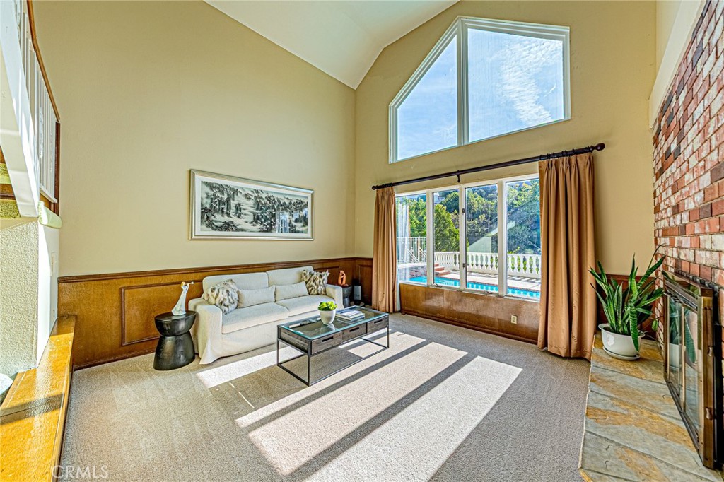 22138 Rim Fire Lane Diamond Bar, CA 91765 - Photo 3 of 61 a living room with furniture and a floor to ceiling window