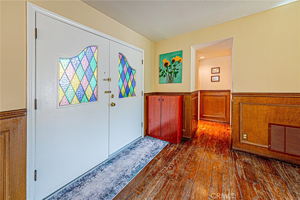 22138 Rim Fire Lane Diamond Bar, CA 91765 - Photo 37 of 61 a view of a bedroom with wooden floor and a window