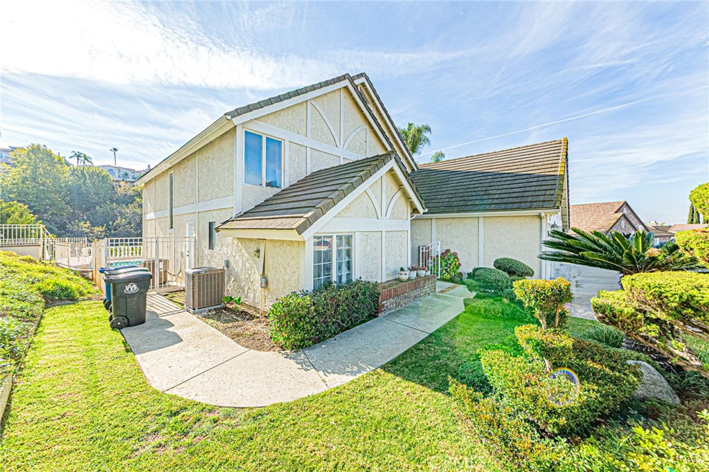22138 Rim Fire Lane Diamond Bar, CA 91765 - Photo 47 of 61 a view of a house with a backyard