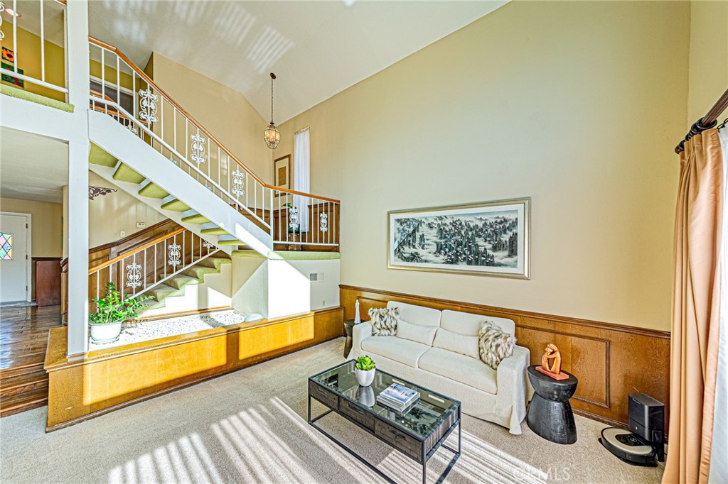 22138 Rim Fire Lane Diamond Bar, CA 91765 - Photo 5 of 61 a living room with furniture and a floor to ceiling window