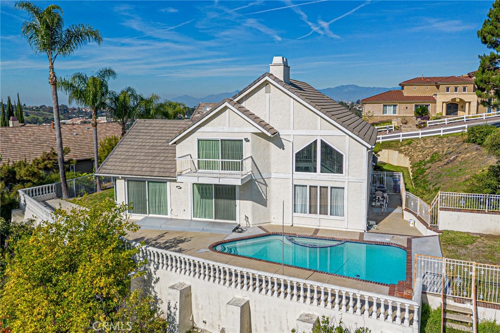 22138 Rim Fire Lane Diamond Bar, CA 91765 - Photo 53 of 61 a front view of a house with a porch