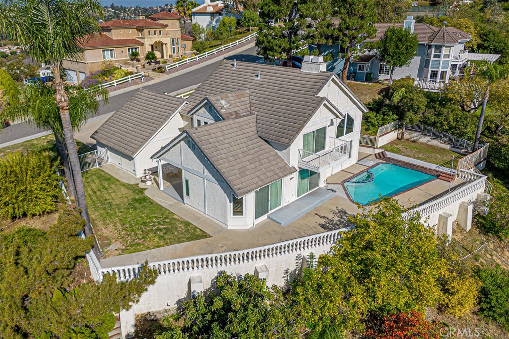 22138 Rim Fire Lane Diamond Bar, CA 91765 - Photo 54 of 61 an aerial view of a house with a yard and deck