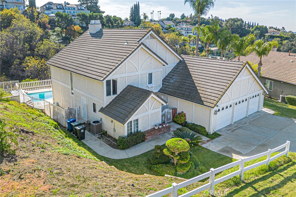 22138 Rim Fire Lane Diamond Bar, CA 91765 - Photo 58 of 61 a aerial view of a house with a yard