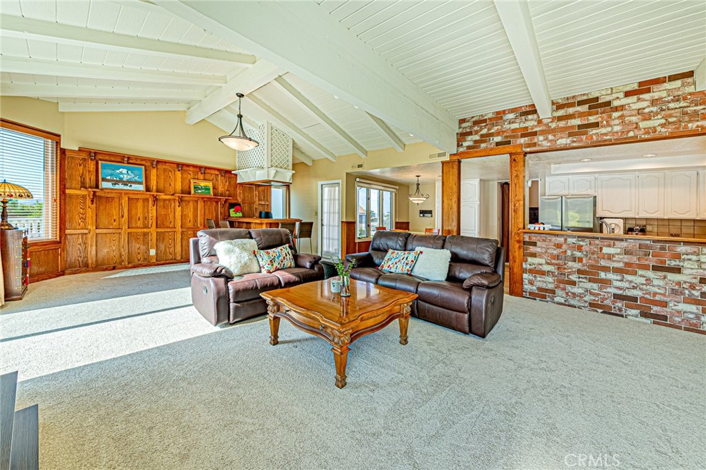 22138 Rim Fire Lane Diamond Bar, CA 91765 - Photo 10 of 61 a living room with furniture and a chandelier