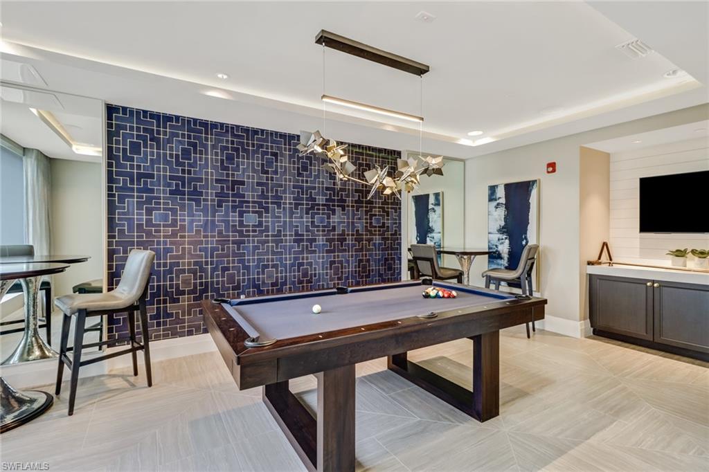 1135 3rd Avenue South, Unit 403 Naples, FL 34102 - Photo 29 of 34 Game room with pool table and a raised ceiling