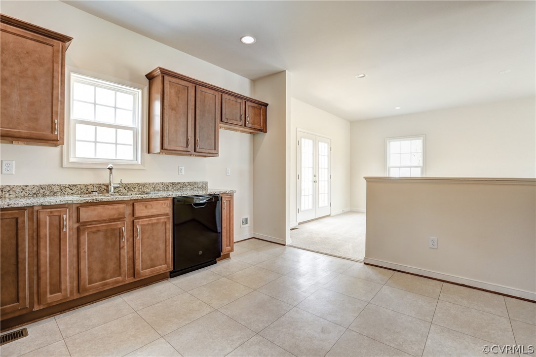 7118 Appelman Road Chesterfield, VA 23832 - Photo 8 of 19 a spacious bathroom with a granite countertop sink and a mirror