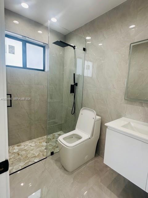 11870 Southwest 5th Street, Unit A Miami, FL 33184 - Photo 9 of 18 a bathroom with a toilet and a shower