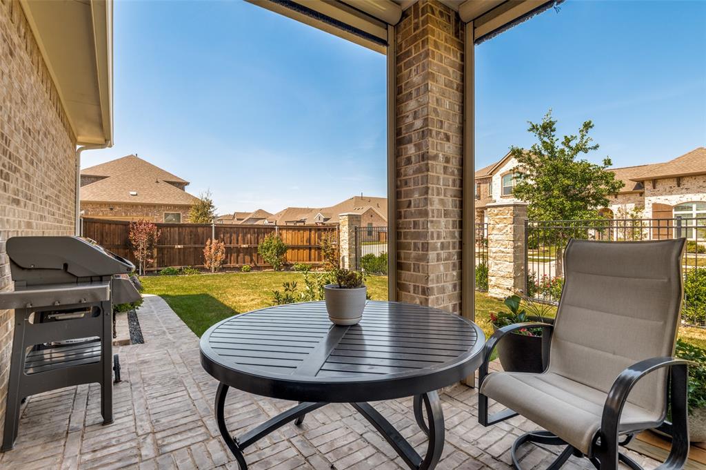 4724 Raspberry Spar Court Arlington, TX 76005 - Photo 30 of 40 a view of a patio with swimming pool