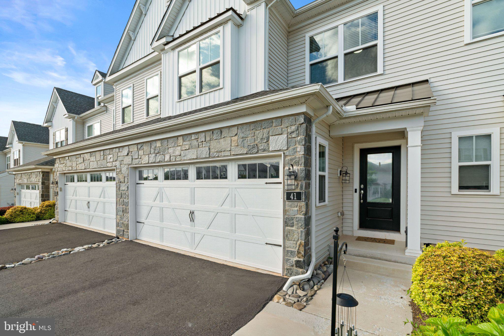 41 Spring Mill Drive Warminster, PA 18974 - Photo 2 of 45 Charming stone-front townhouse exterior.