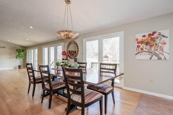 147 Coburn Road Berlin, MA 01503 - Photo 3 of 25 a view of a dining room with furniture window and outside view