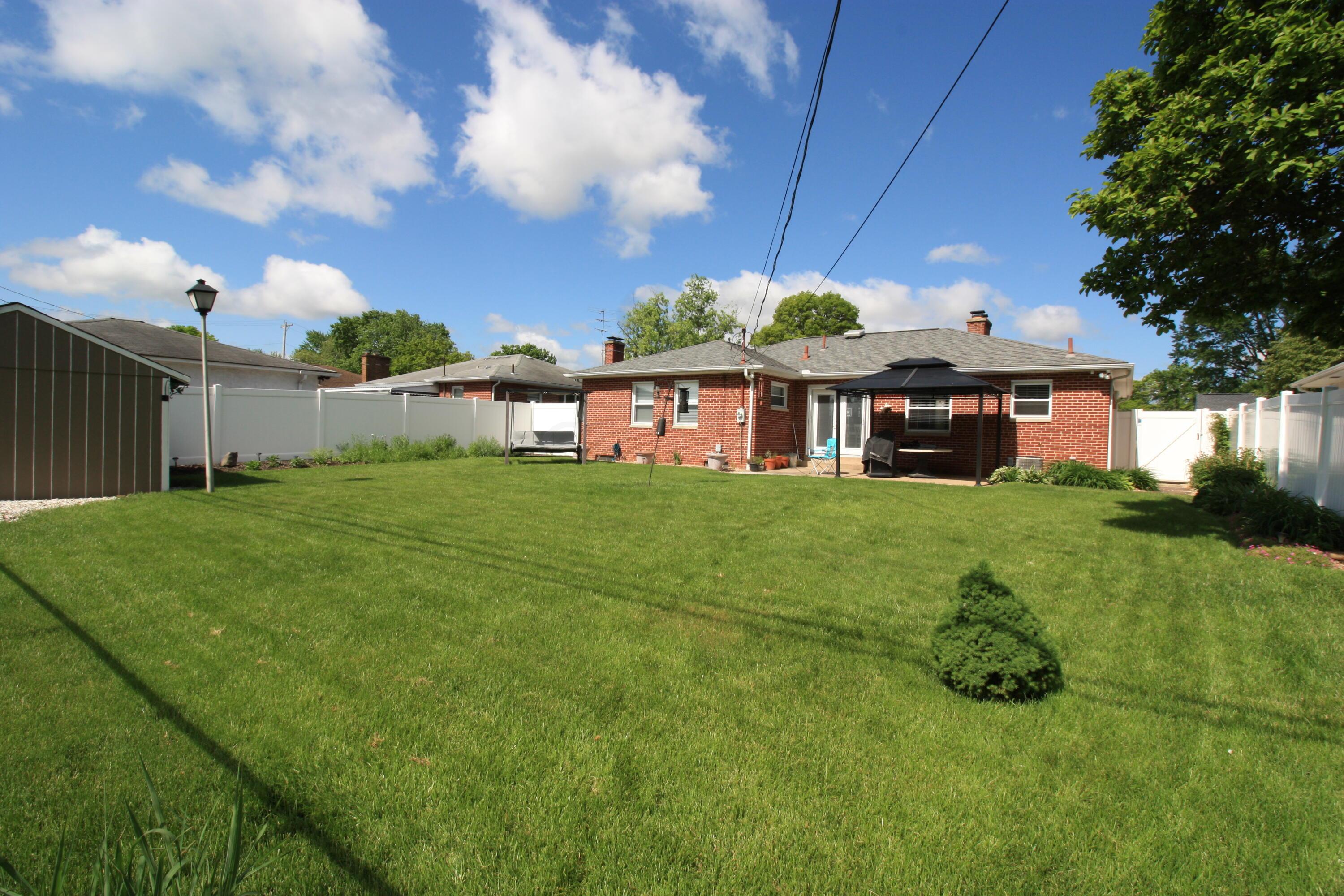330 Topsfield Road Columbus, OH 43228 - Photo 23 of 28 view from back fence towards house