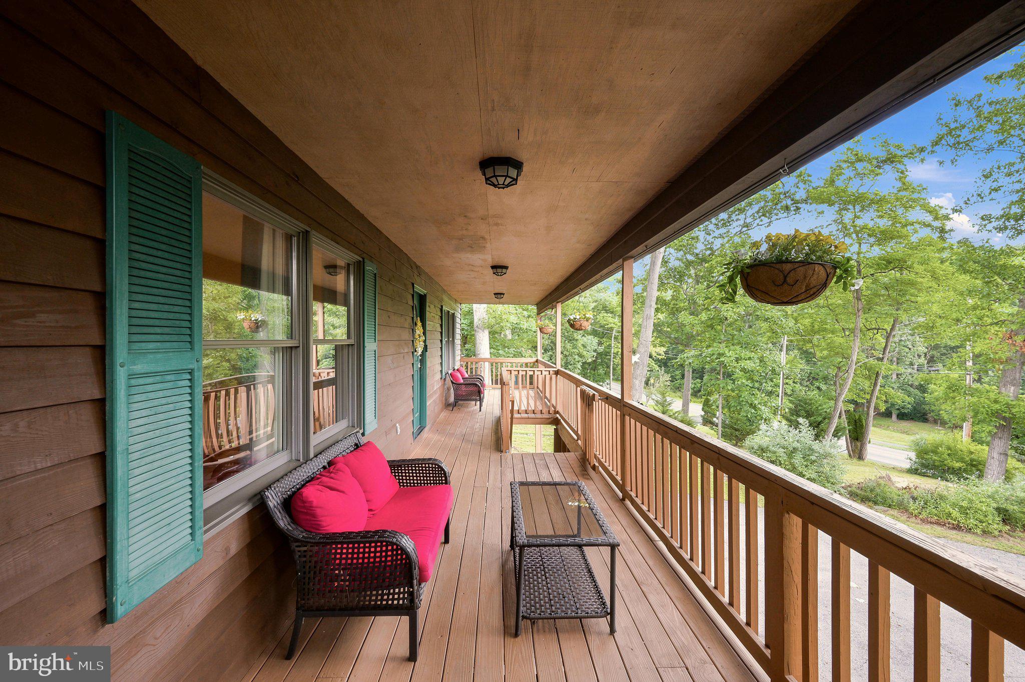 150 Holiday Road Cross Junction, VA 22625 - Photo 10 of 97 Covered deck in the front