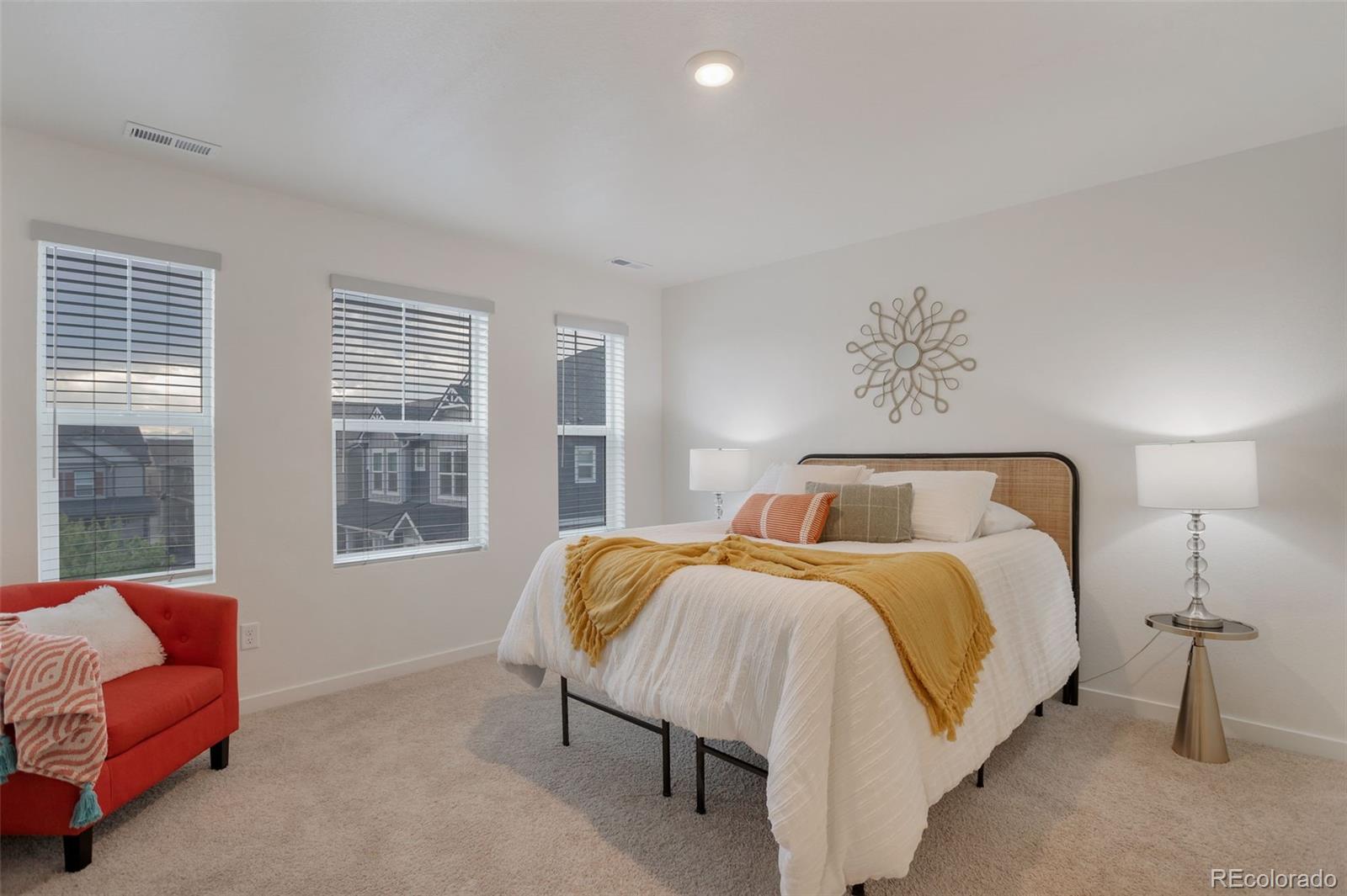 7017 Kali Court Frederick, CO 80530 - Photo 4 of 15 a bedroom with a bed and a window