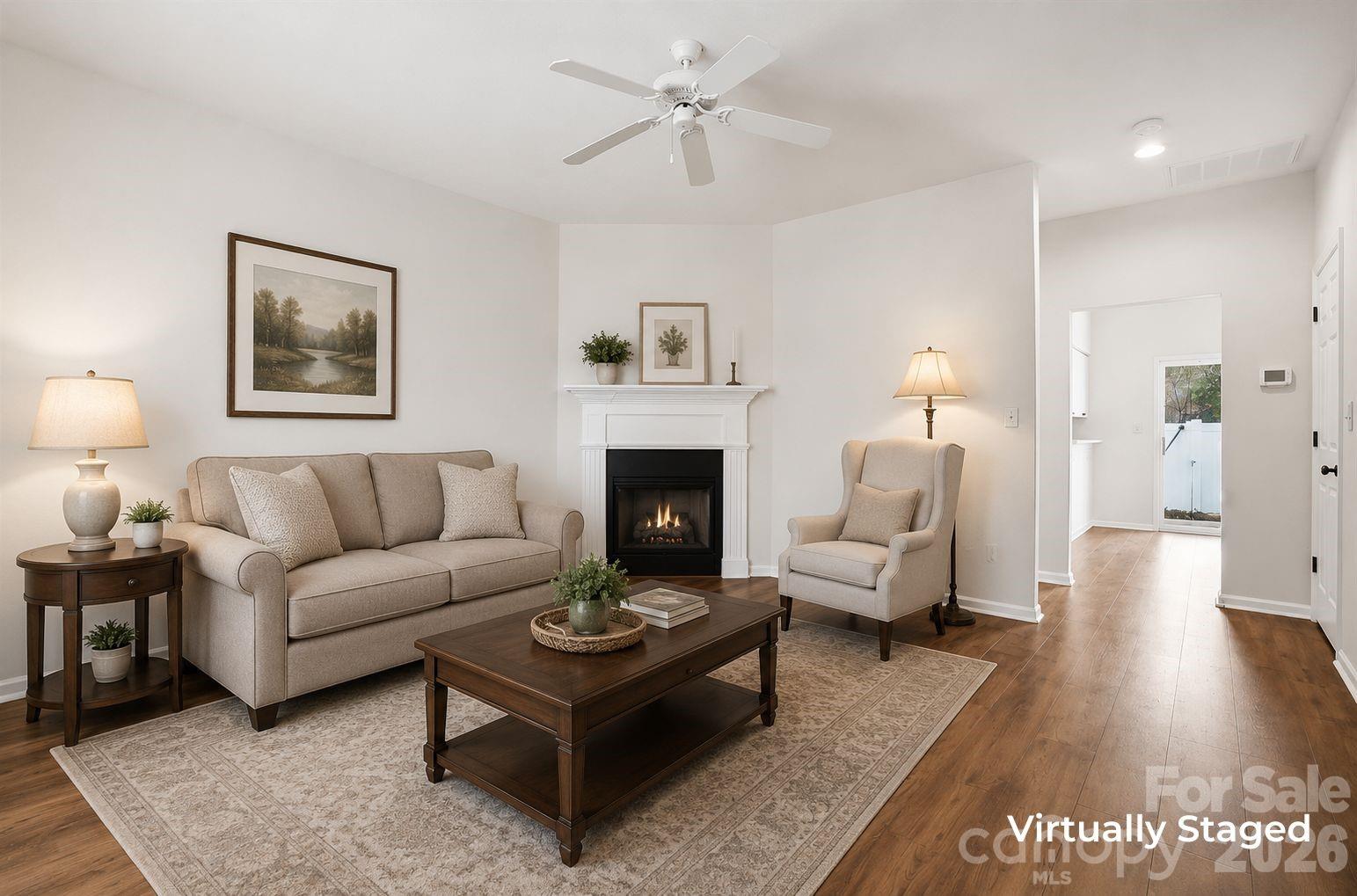 711 Stone Village Drive Fort Mill, SC 29708 - Photo 2 of 46 a living room with furniture and a fireplace