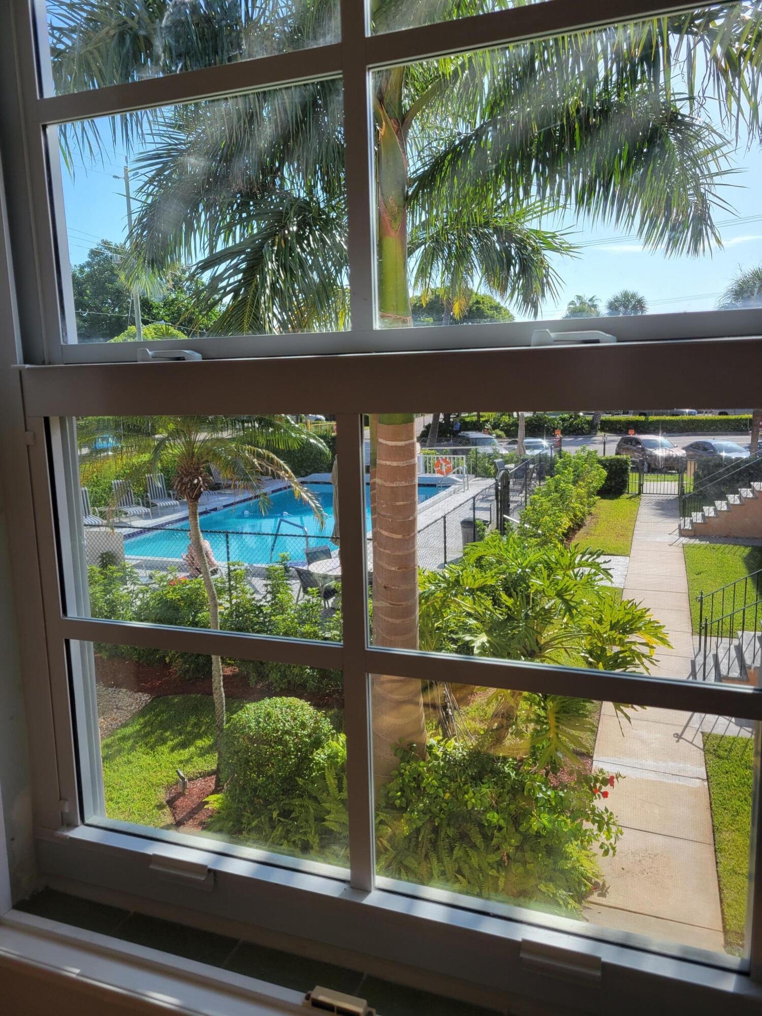 101 South Golfview Road, Unit 11 Lake Worth Beach, FL 33460 - Photo 18 of 28 a view of a lake from a window