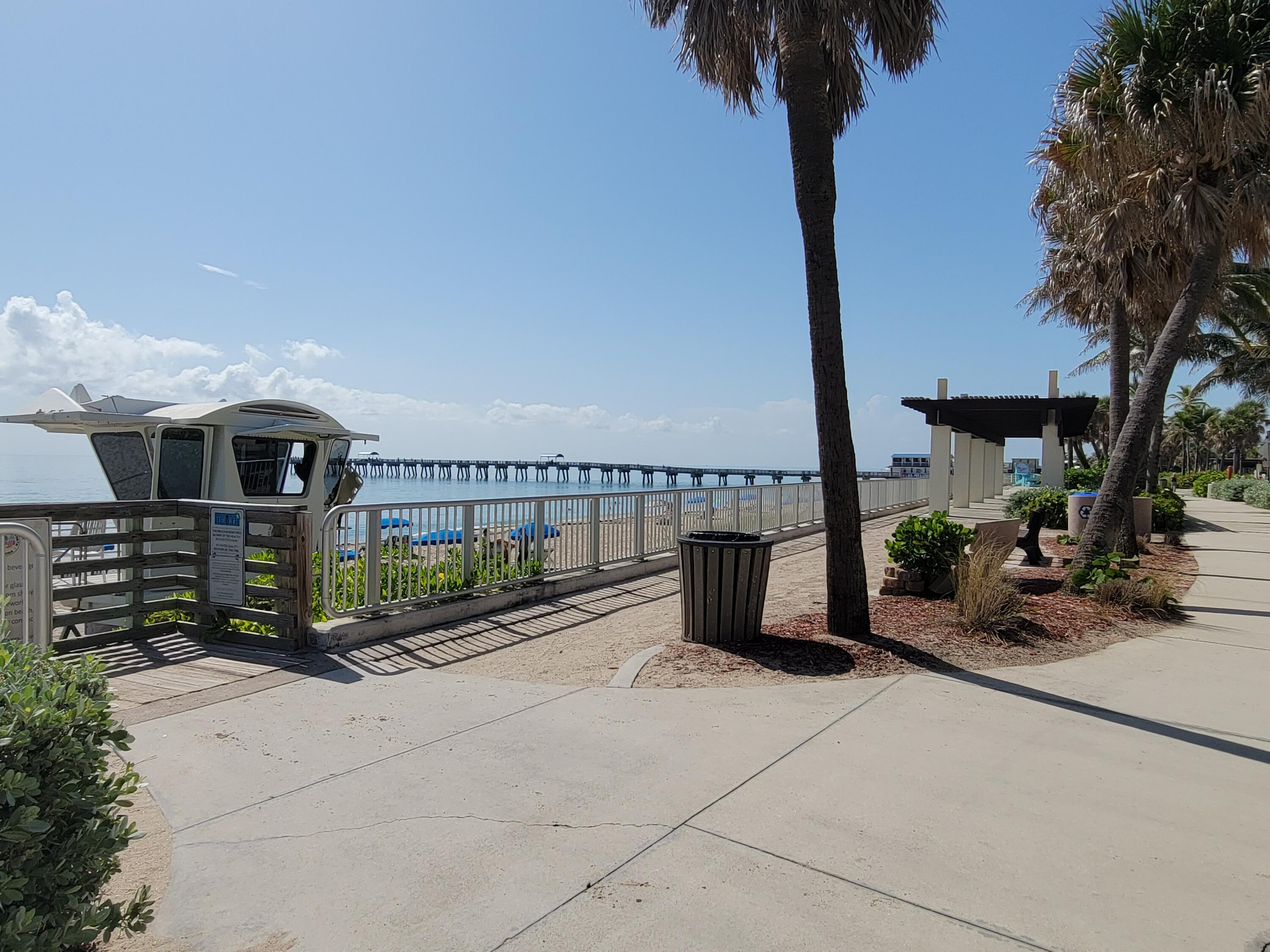 101 South Golfview Road, Unit 11 Lake Worth Beach, FL 33460 - Photo 28 of 28 a front view of a building with parking space