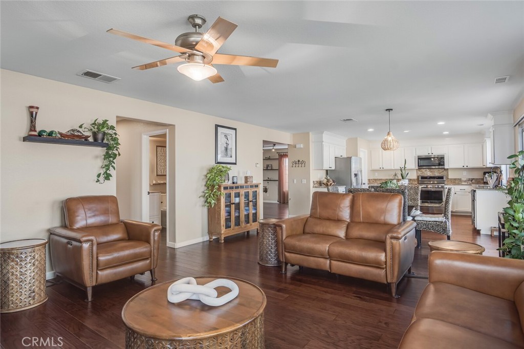 In the gated community of River Ranch, this home doesn’t just show up, it makes an entrance.