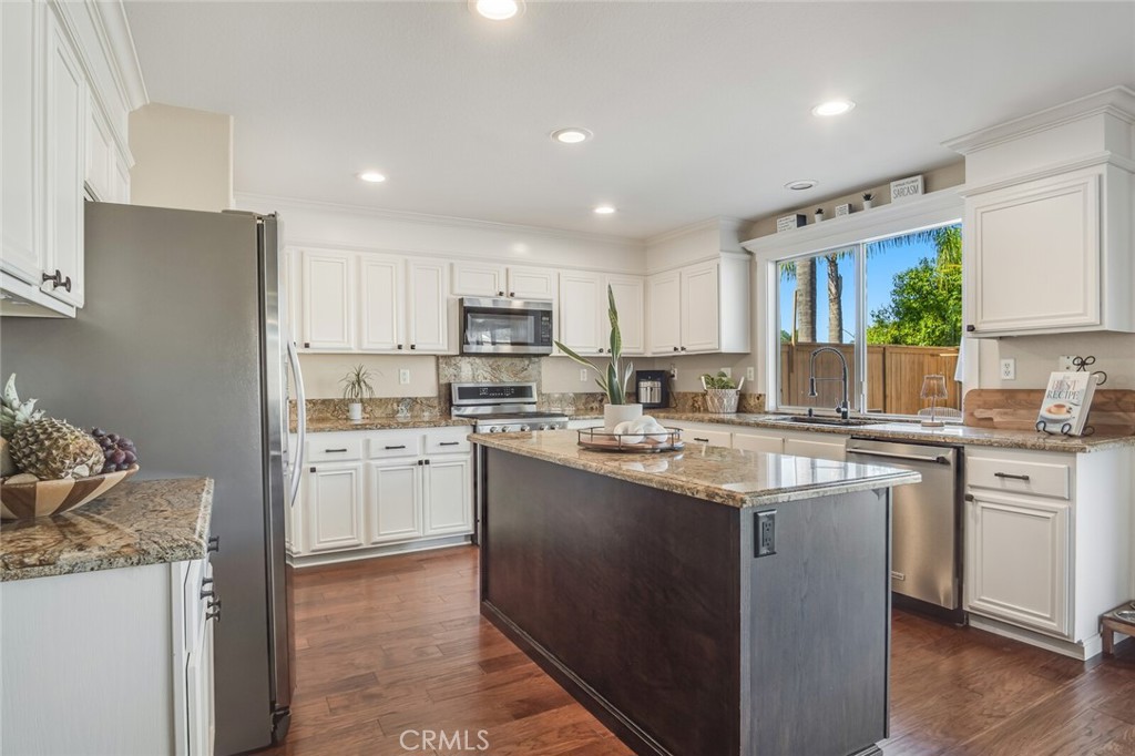 4330 Forest Ranch Way Oceanside, CA 92057 - Photo 15 of 51 The space space truly delivers. Imagine preparing meals here with room for everything. Spreading out ingredients, hosting helping hands around the island and never feeling crowded.
