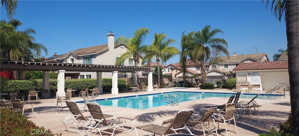 4330 Forest Ranch Way Oceanside, CA 92057 - Photo 48 of 51 The pool feels like your own private resort, reserved exclusively for residents with secure key access, adding both convenience and peace of mind. It’s a well-maintained space designed for relaxing afternoons and easy weekend fun, complete with a sparkling pool and adjacent spa for unwinding after a long day.