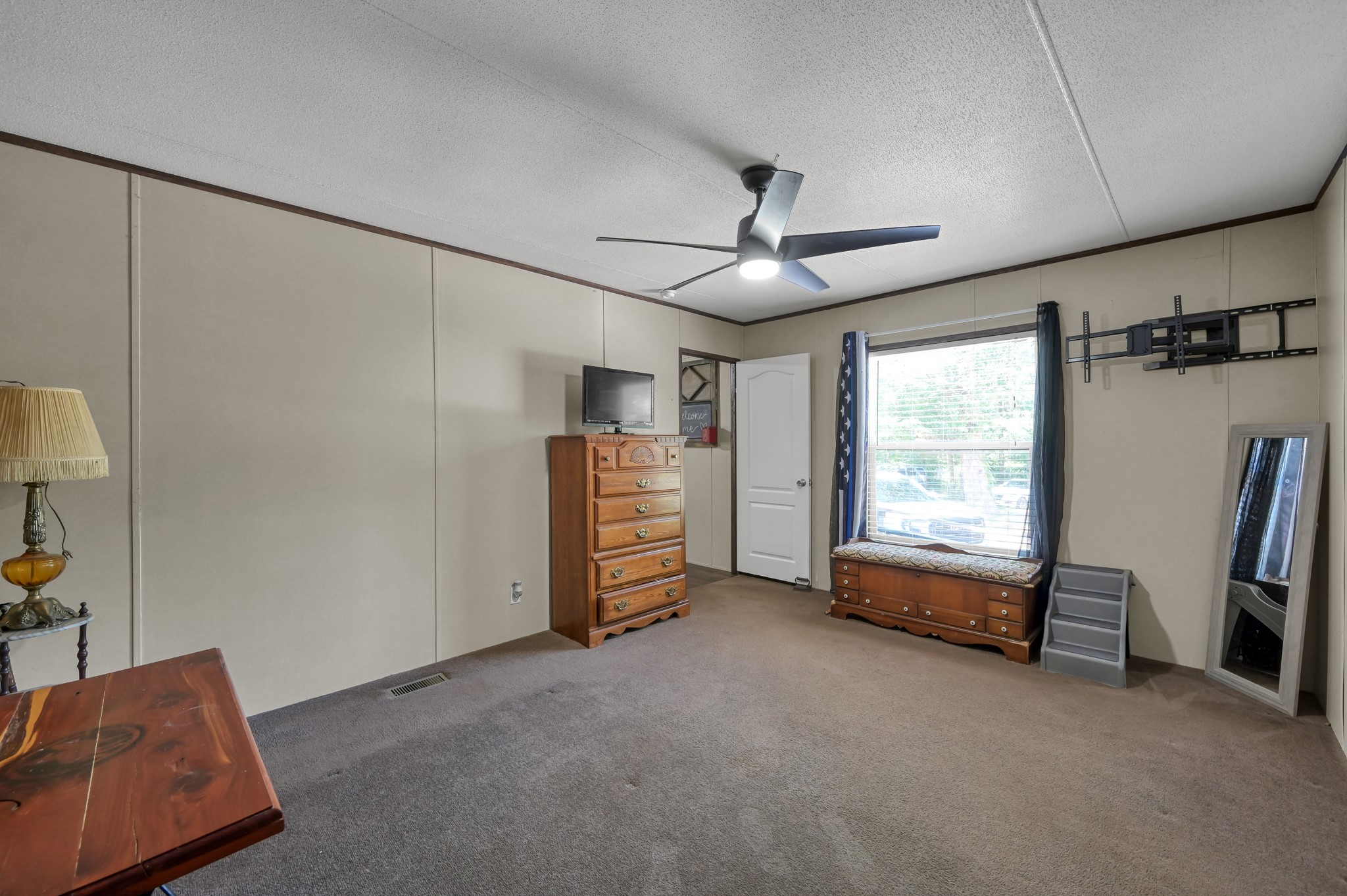 400 Raven Hill Road Oakhurst, TX 77359 - Photo 23 of 45 a view of a livingroom with furniture and a window