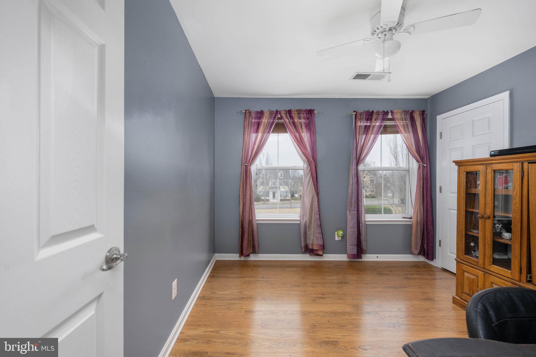 17230 Library Boulevard Ruther Glen, VA 22546 - Photo 31 of 81 a view of an empty room with window and hardwood floor