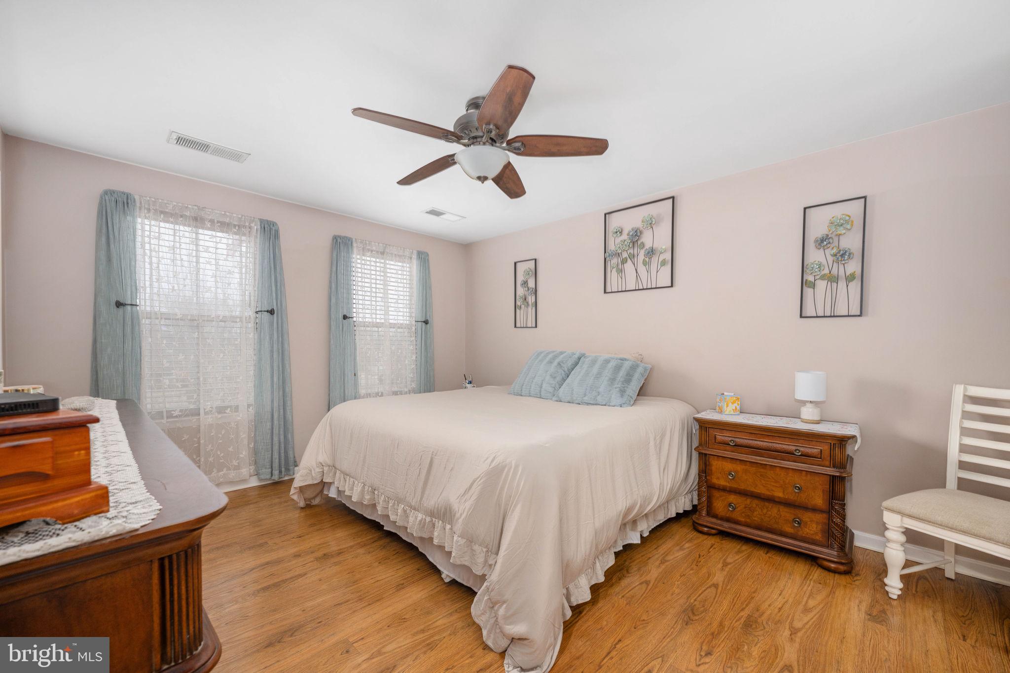 17230 Library Boulevard Ruther Glen, VA 22546 - Photo 37 of 81 a bedroom with a bed and a flat screen tv