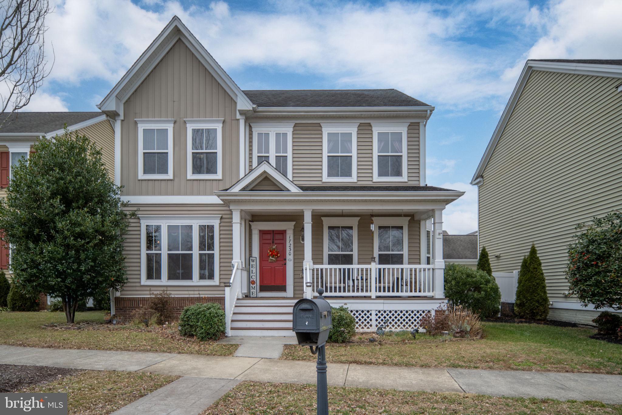 17230 Library Boulevard Ruther Glen, VA 22546 - Photo 65 of 81 a front view of a house with garden and plants