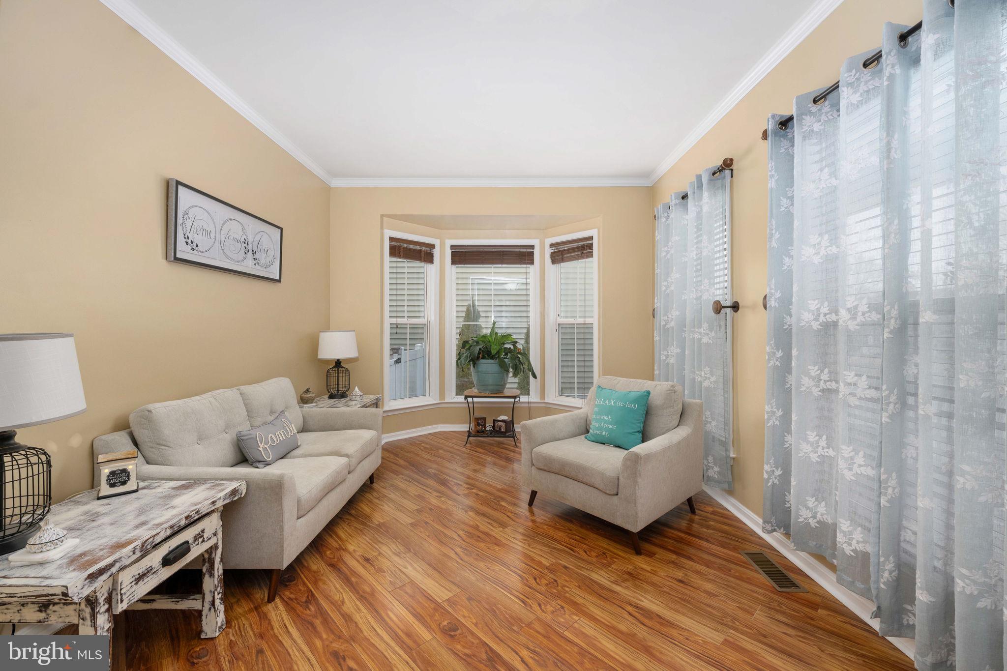 17230 Library Boulevard Ruther Glen, VA 22546 - Photo 8 of 81 a living room with furniture and a large window