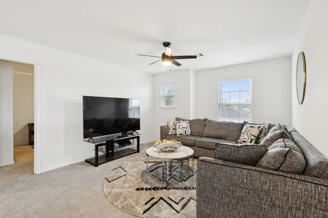 a view of kitchen with cabinets and wooden floor