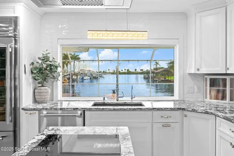 $1,590,000 | 116 Cat Cay Lane, Indian Harbour Beach, FL 32937