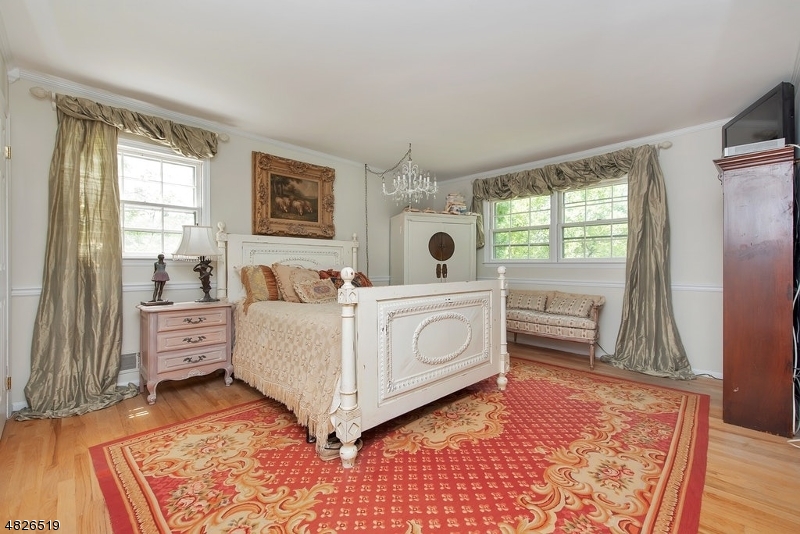 517 High Street Stirling, NJ 07980 - Photo 15 of 22 a view of a bedroom with furniture and window
