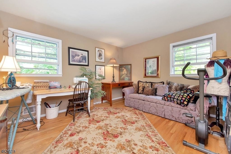 517 High Street Stirling, NJ 07980 - Photo 19 of 22 a living room with furniture and a large window