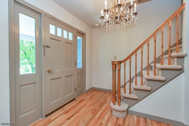 517 High Street Stirling, NJ 07980 - Photo 2 of 22 a view of entryway and hall with wooden floor