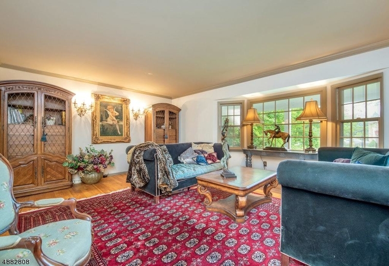 517 High Street Stirling, NJ 07980 - Photo 4 of 22 a living room with furniture and a large window