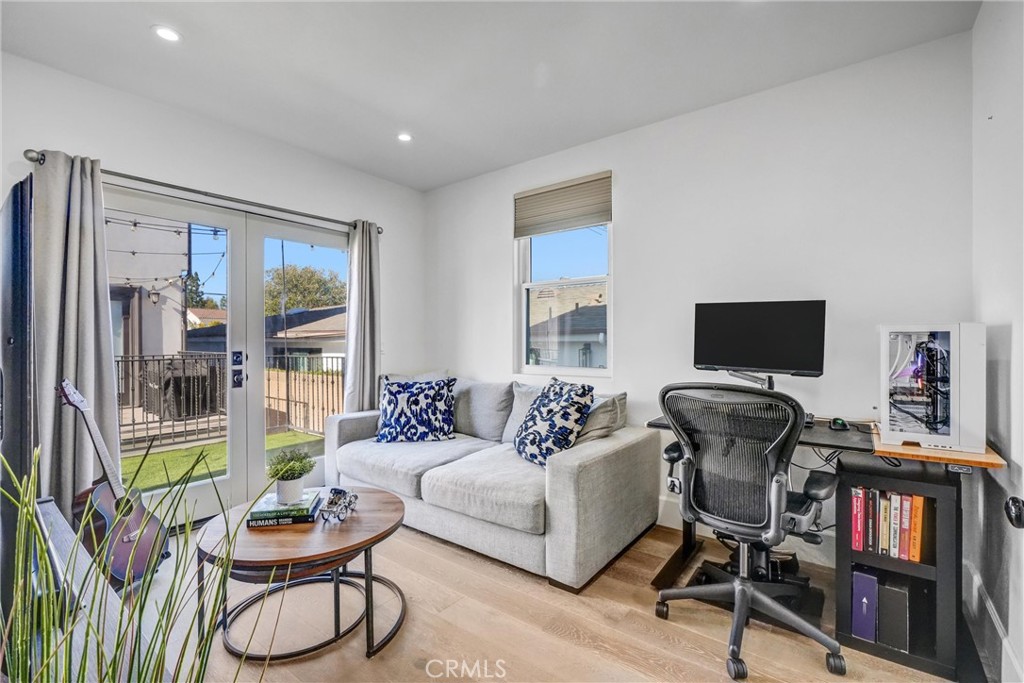 18228 Grevillea Avenue Redondo Beach, CA 90278 - Photo 17 of 39 a living room with furniture and a flat screen tv