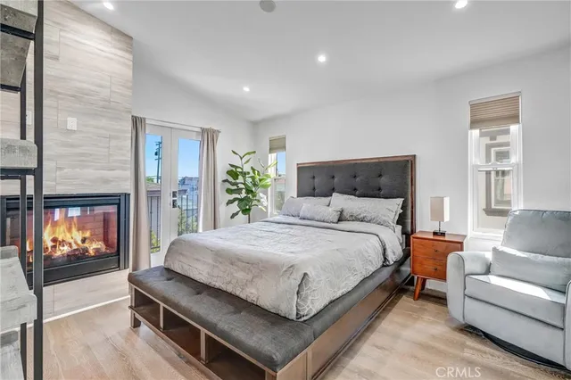 a bed room with a bed and a couch