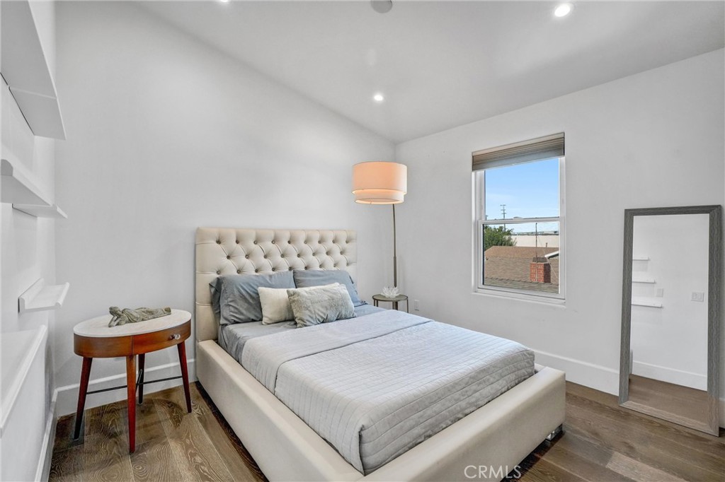 18228 Grevillea Avenue Redondo Beach, CA 90278 - Photo 29 of 39 a bedroom with a bed and a table