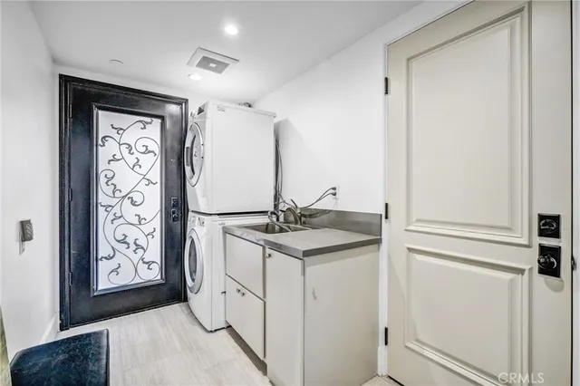 a kitchen with stainless steel appliances granite countertop a stove and a refrigerator