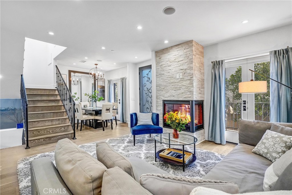 18228 Grevillea Avenue Redondo Beach, CA 90278 - Photo 10 of 39 a living room with furniture and a fireplace