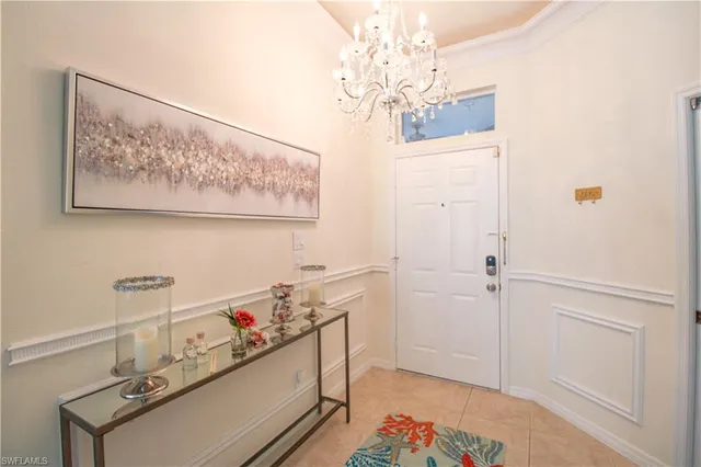 a view of a kitchen with dining area windows and chairs