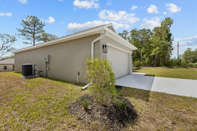 a house with trees in the background